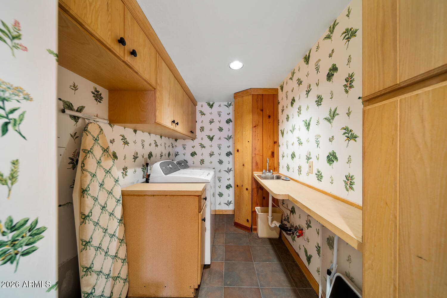 2539 Butterfly Lane Pinetop, AZ 85935 - Photo 46 of 61 a bathroom with a sink and a mirror