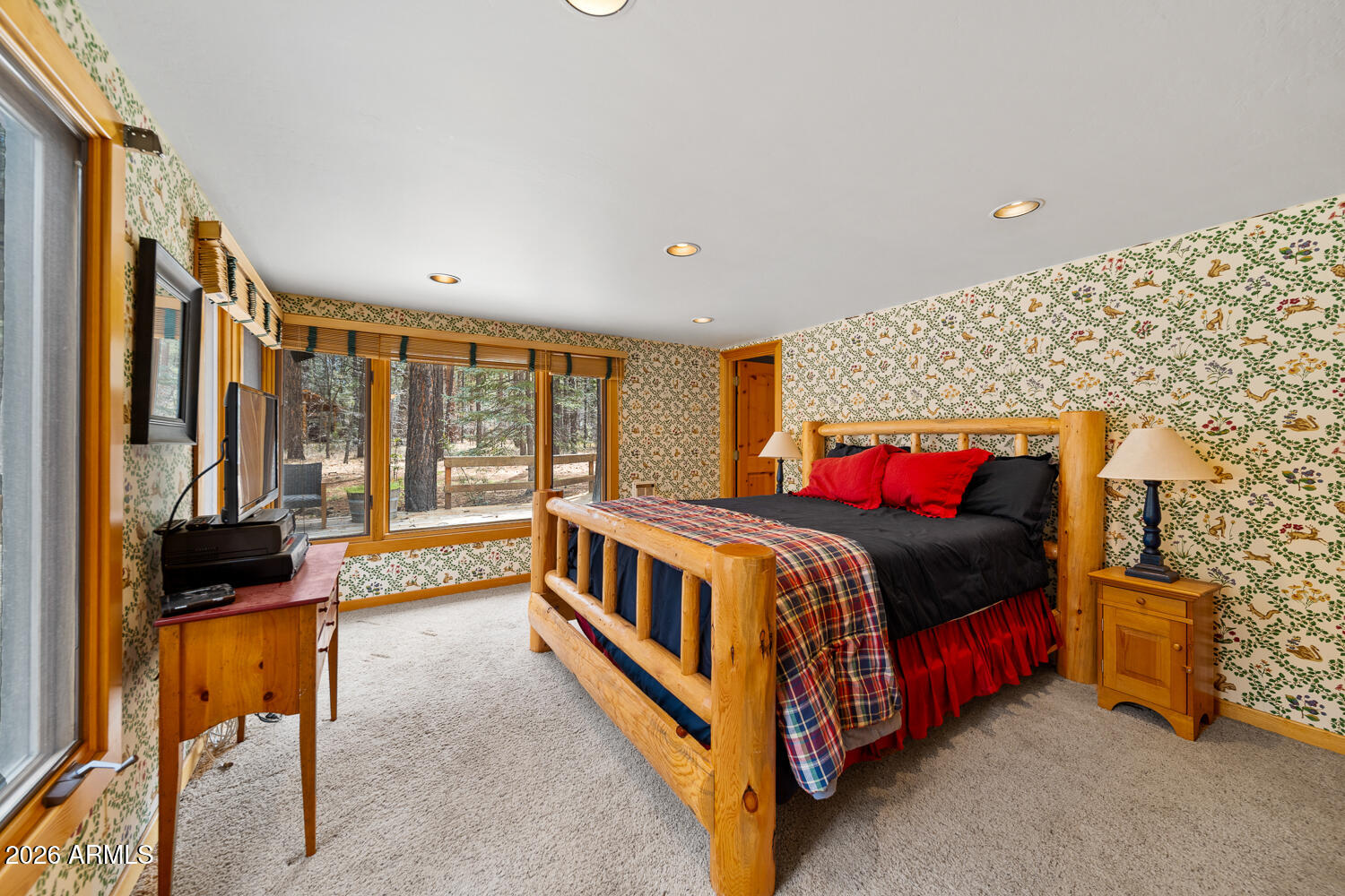2539 Butterfly Lane Pinetop, AZ 85935 - Photo 48 of 61 a bedroom with a bed and a large window