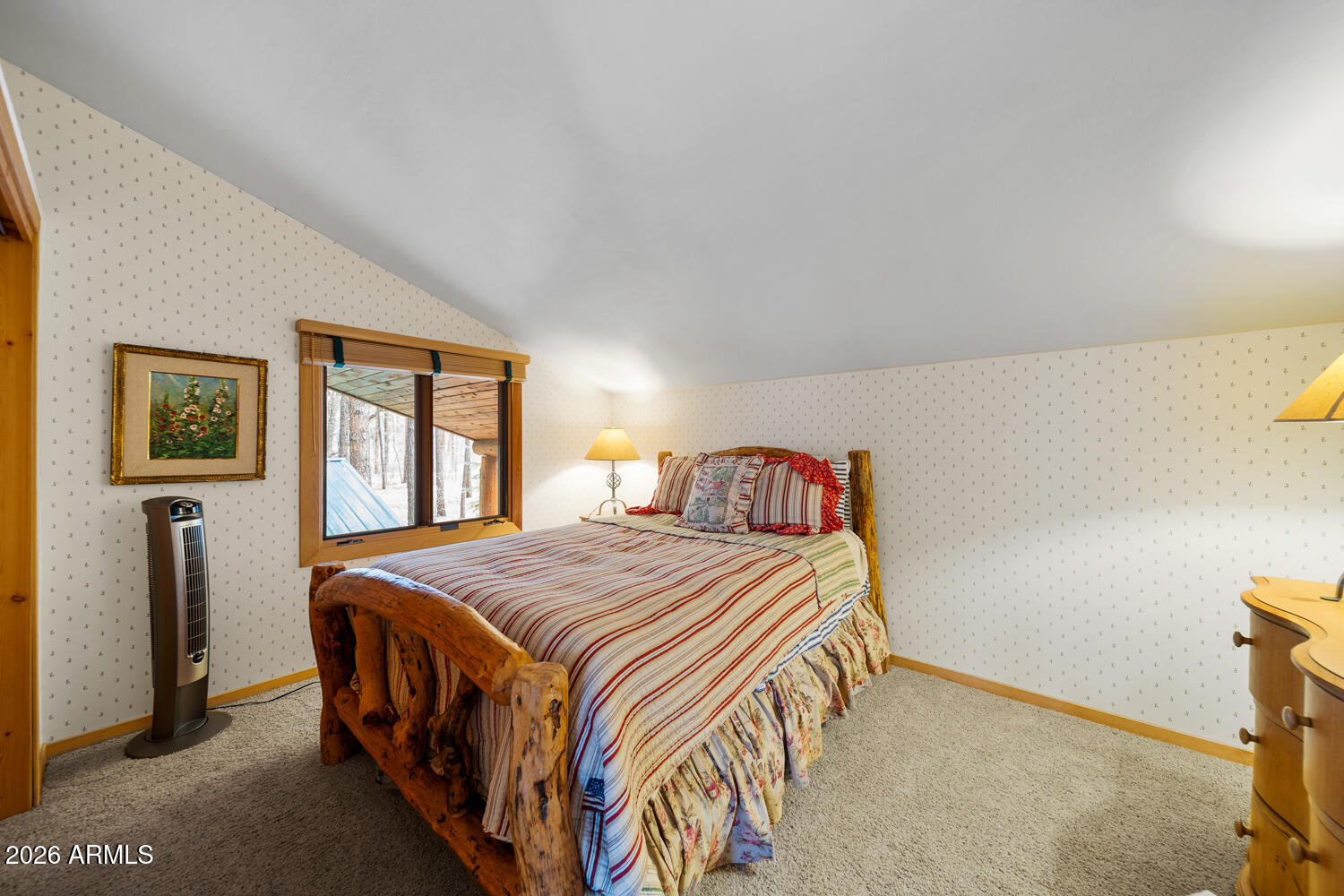 2539 Butterfly Lane Pinetop, AZ 85935 - Photo 53 of 61 a bedroom with a bed and a window