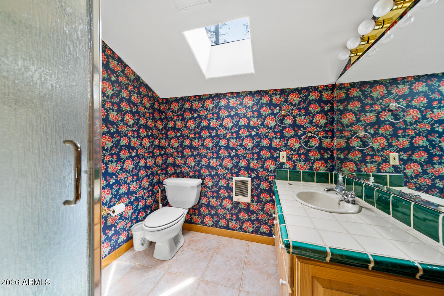 2539 Butterfly Lane Pinetop, AZ 85935 - Photo 54 of 61 a bathroom with a toilet and a shower curtain