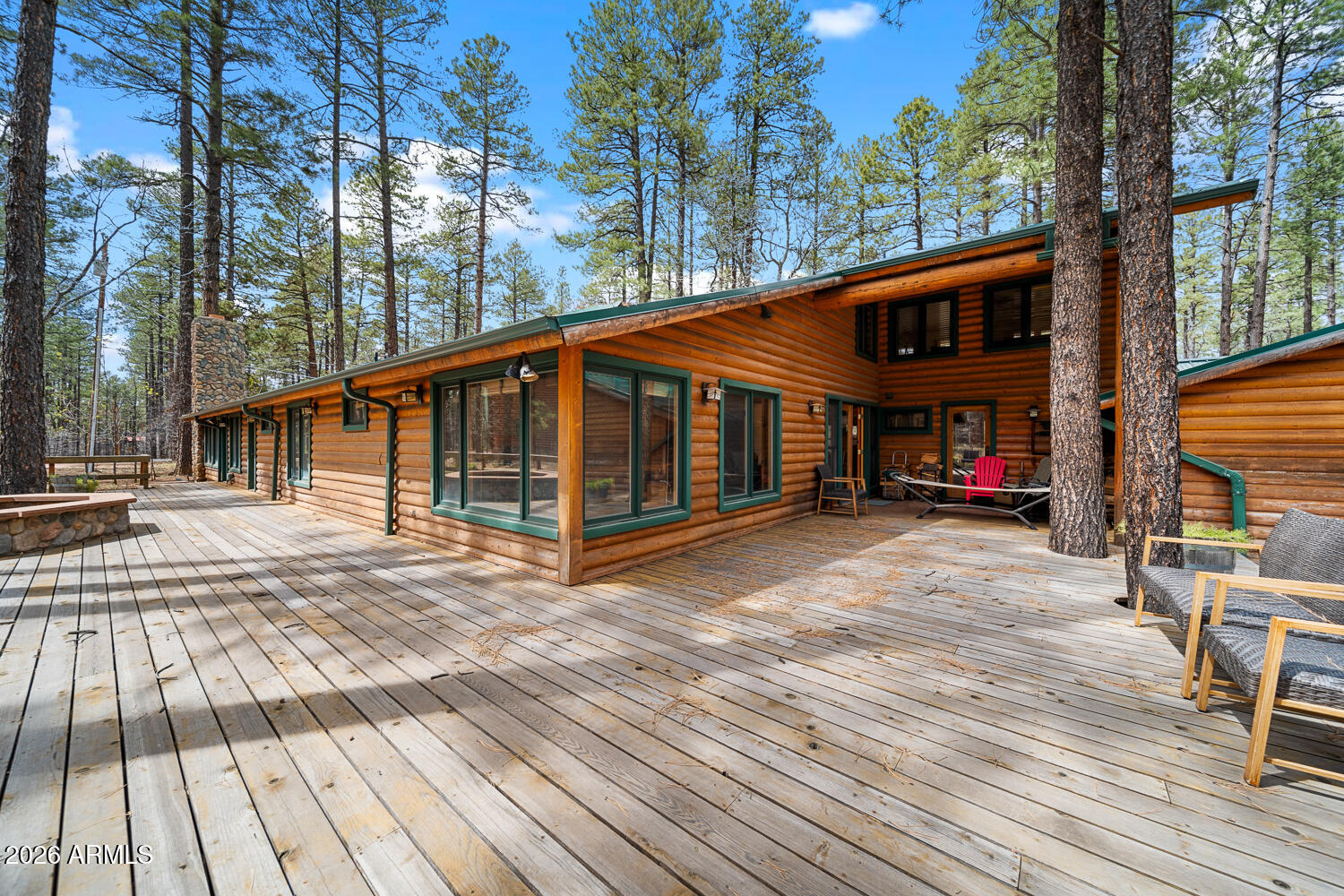 2539 Butterfly Lane Pinetop, AZ 85935 - Photo 55 of 61 a view of a house with pool and sitting area