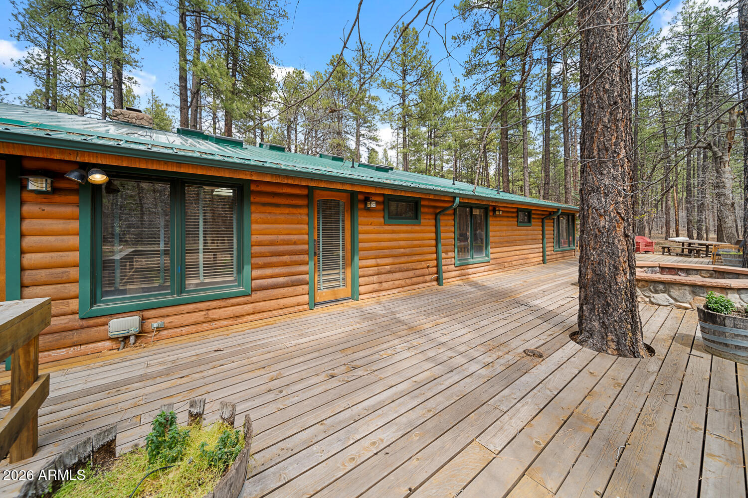 2539 Butterfly Lane Pinetop, AZ 85935 - Photo 57 of 61 a balcony with wooden floor and outdoor seating