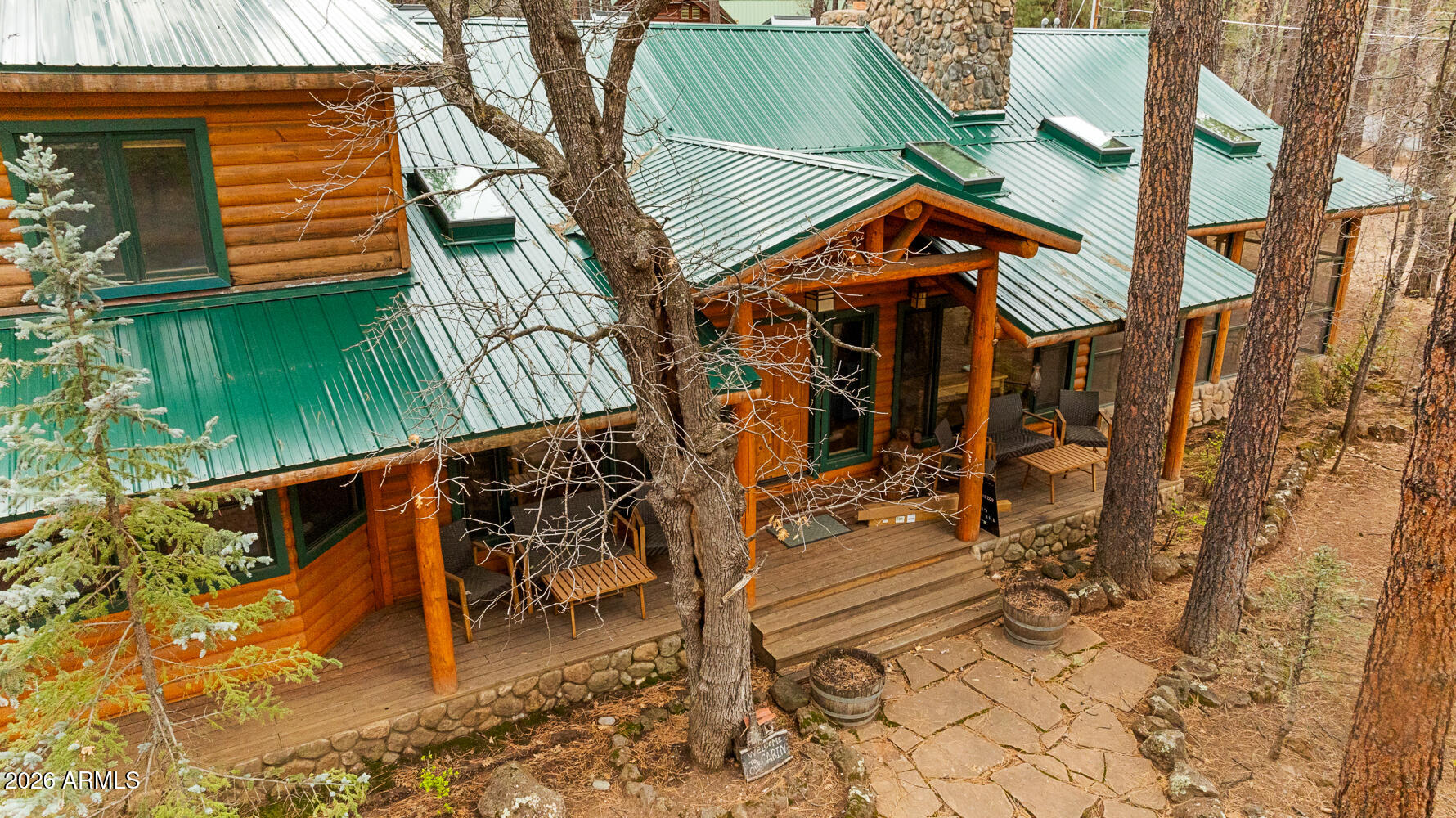 2539 Butterfly Lane Pinetop, AZ 85935 - Photo 8 of 61 a backyard of a house with barbeque oven table and chairs