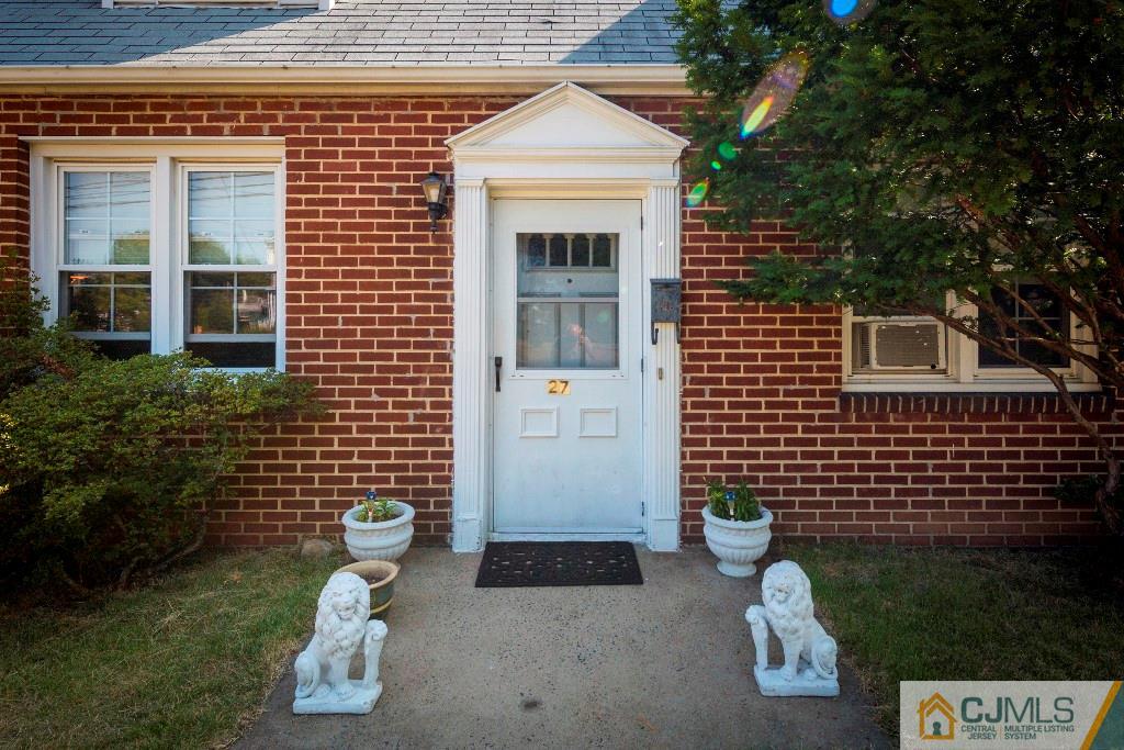 27 Old Post Road Edison, NJ 08817 - Photo 3 of 25 a front view of a house with a yard