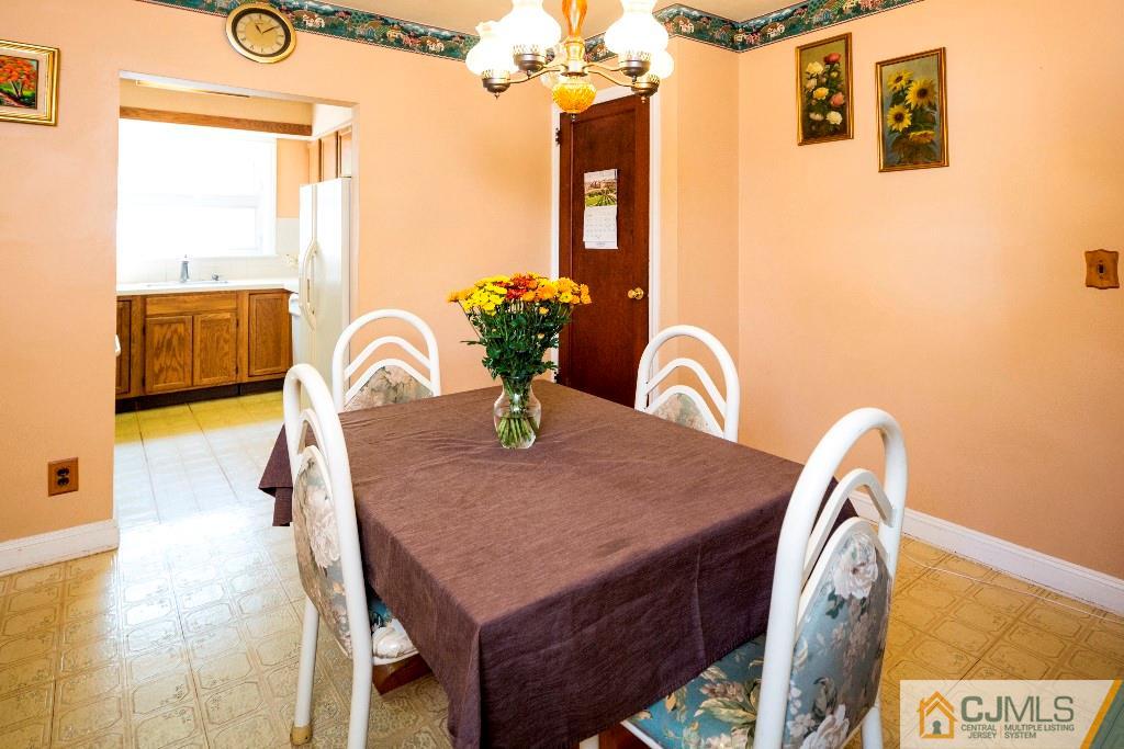 27 Old Post Road Edison, NJ 08817 - Photo 7 of 25 a dining room with furniture and window