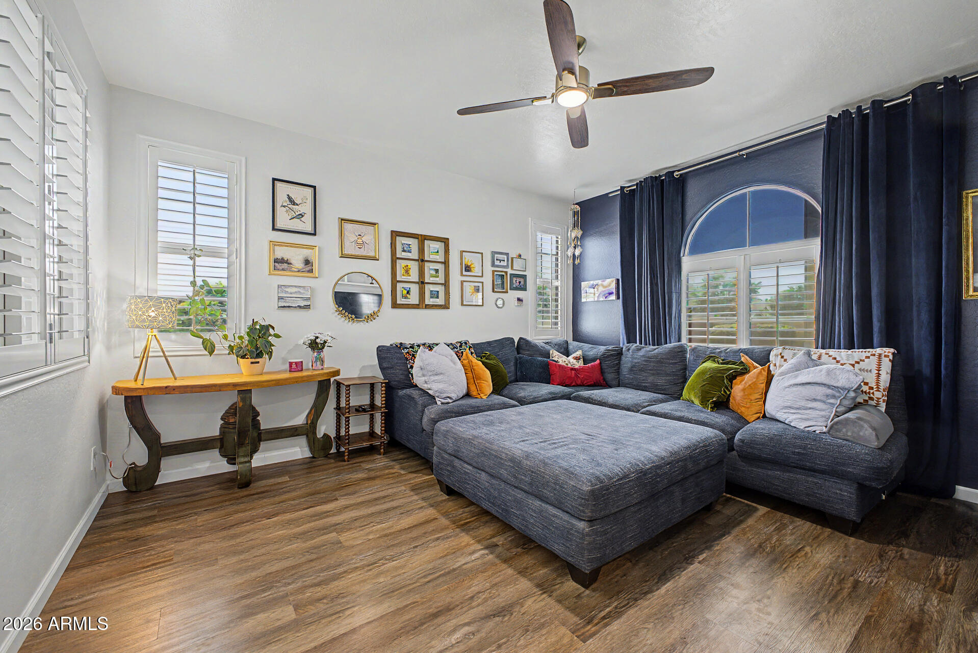 3940 East Turley Street Gilbert, AZ 85295 - Photo 9 of 50 a living room with furniture and a window