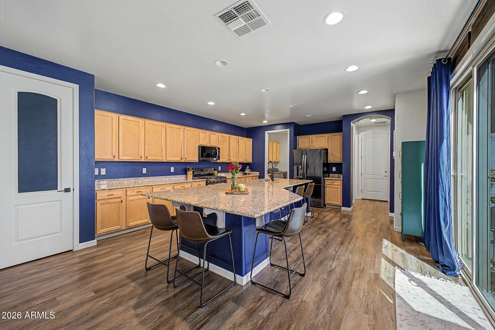 3940 East Turley Street Gilbert, AZ 85295 - Photo 12 of 50 a view of a dining room with furniture window and wooden floor
