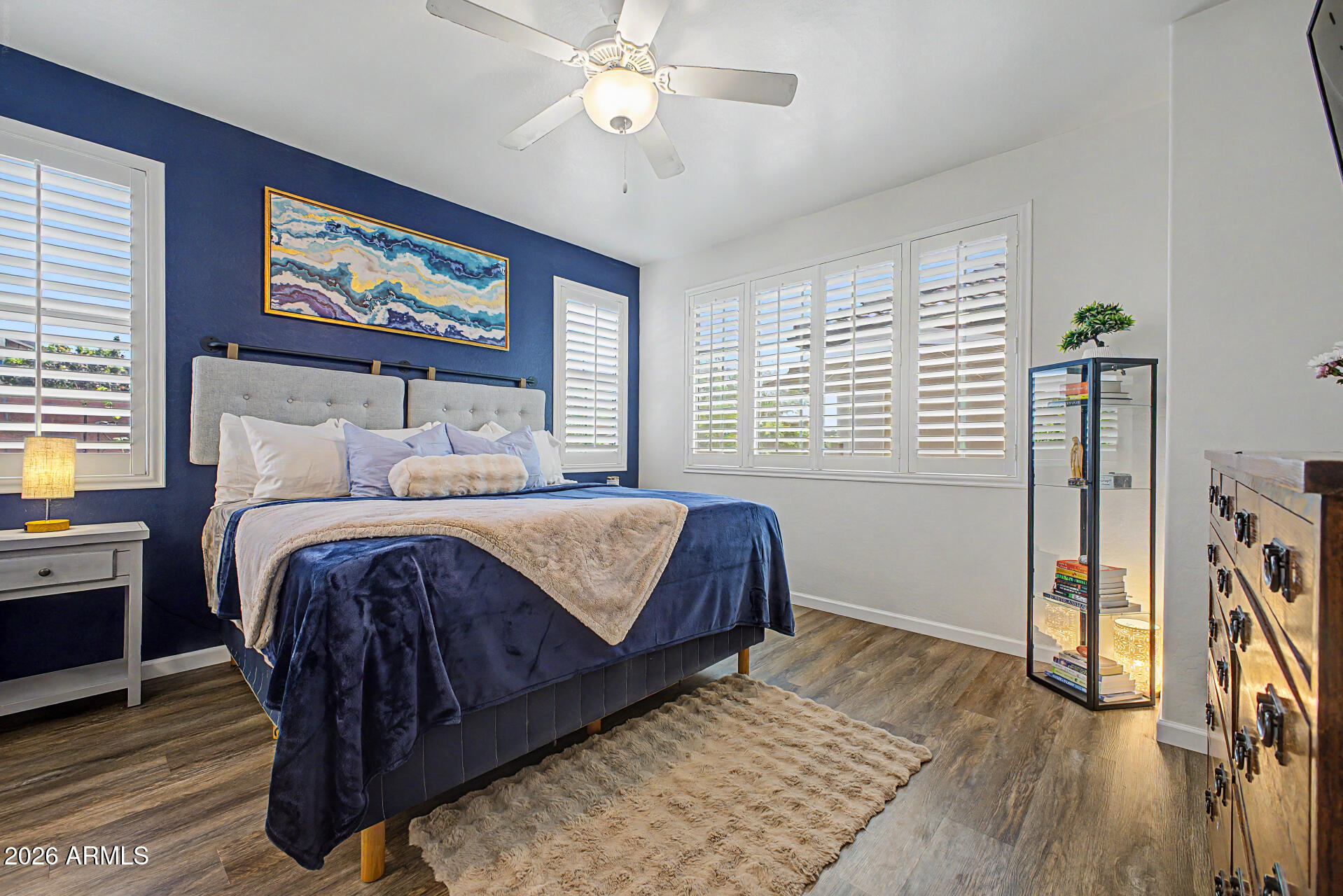 3940 East Turley Street Gilbert, AZ 85295 - Photo 20 of 50 a bedroom with a bed and a flat screen tv