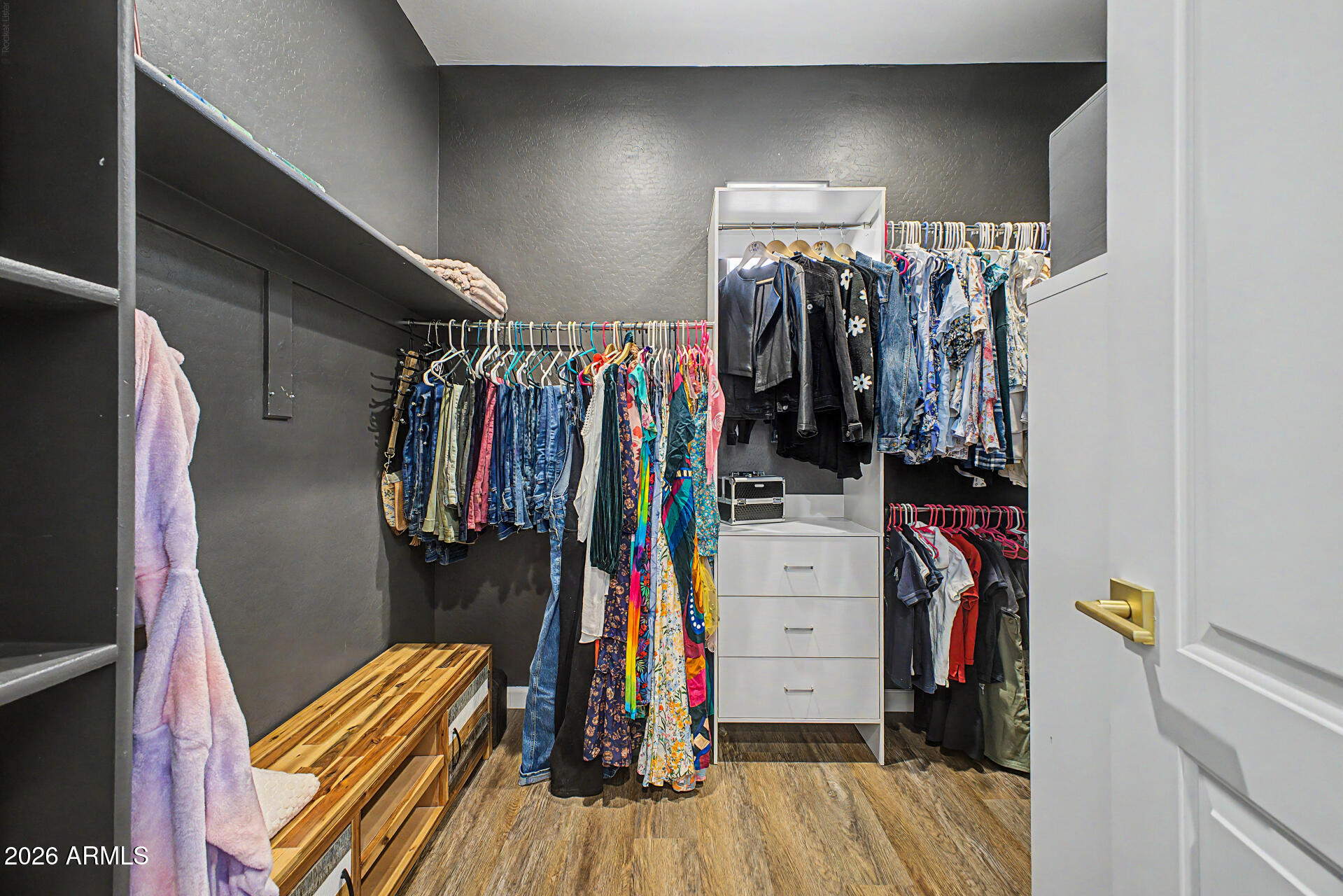 3940 East Turley Street Gilbert, AZ 85295 - Photo 25 of 50 a view of walk in closet with clothes