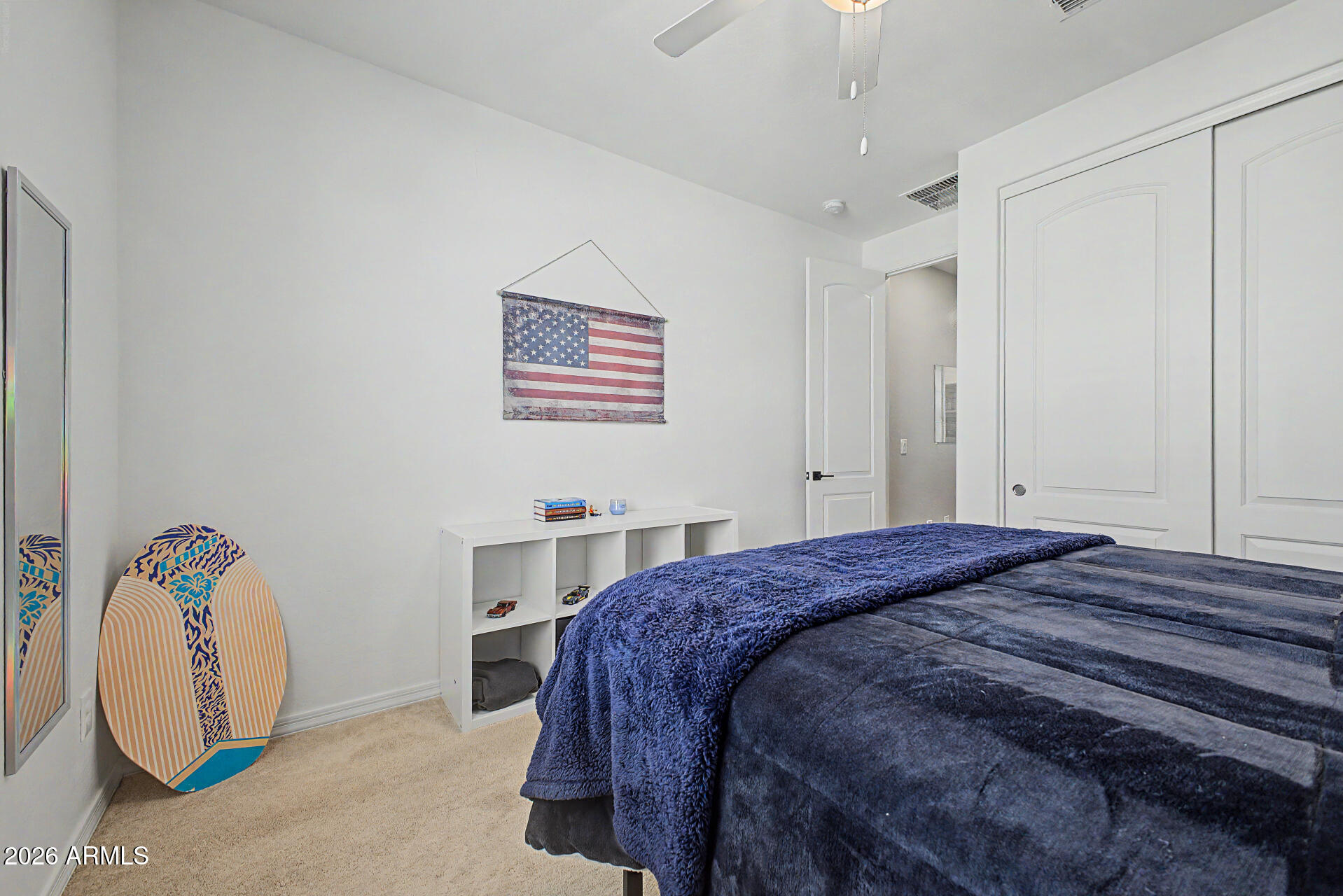 3940 East Turley Street Gilbert, AZ 85295 - Photo 33 of 50 a bedroom with a bed and a painting on the wall