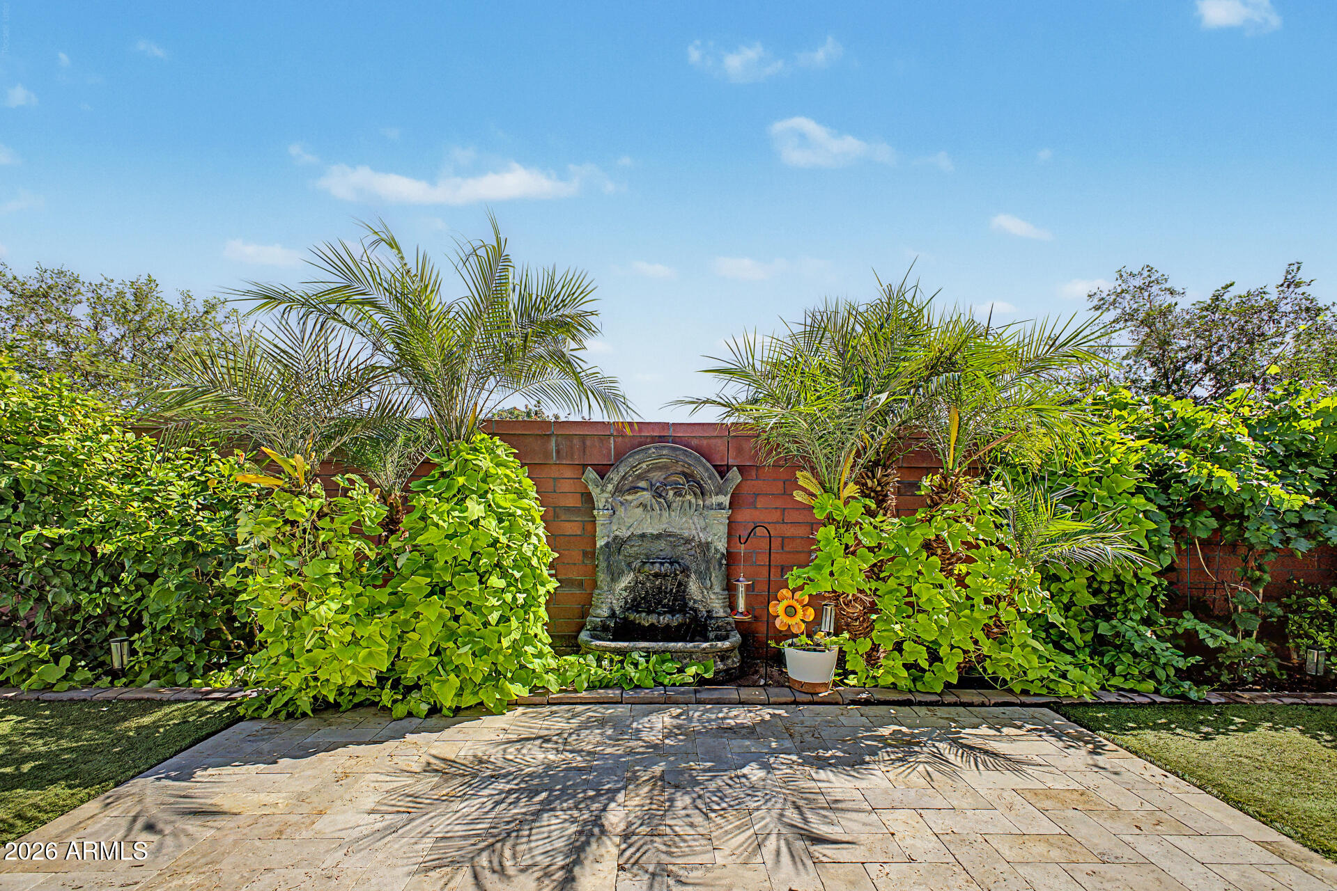 3940 East Turley Street Gilbert, AZ 85295 - Photo 39 of 50 a front view of a house with a garden