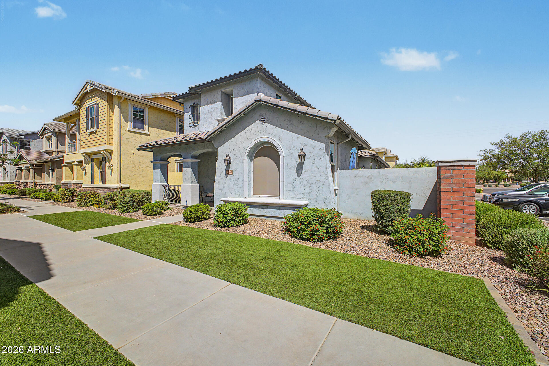 3940 East Turley Street Gilbert, AZ 85295 - Photo 4 of 50 a front view of a house with a yard