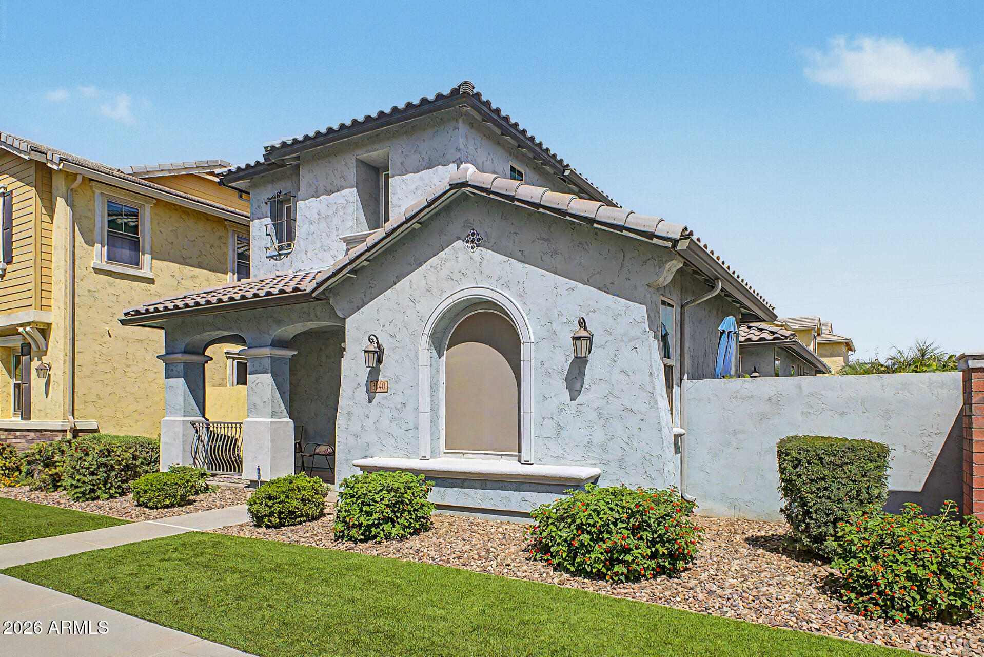 3940 East Turley Street Gilbert, AZ 85295 - Photo 5 of 50 a front view of a house with a yard