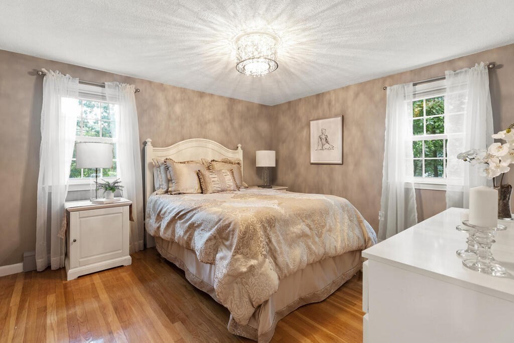 33 Doncaster Circle Lynnfield, MA 01940 - Photo 17 of 31 a bedroom with a bed and a window