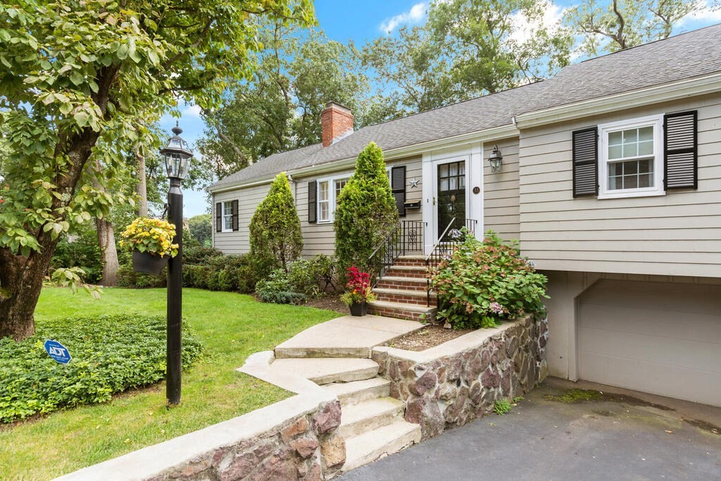 33 Doncaster Circle Lynnfield, MA 01940 - Photo 2 of 31 a front view of a house with garden