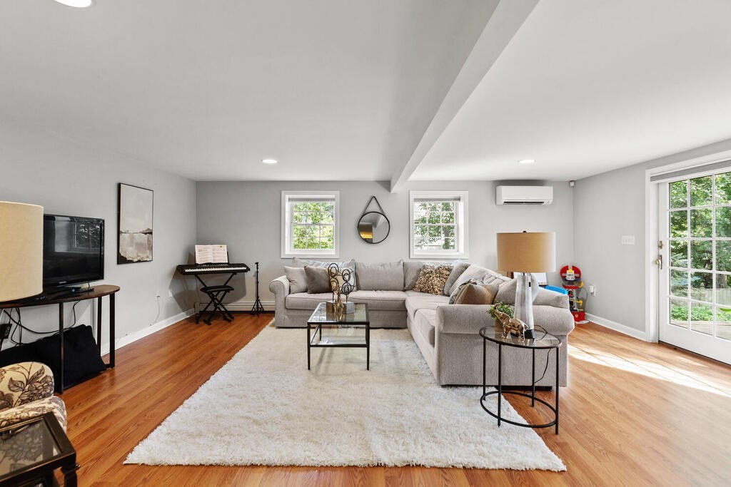 33 Doncaster Circle Lynnfield, MA 01940 - Photo 23 of 31 a living room with furniture rug and window