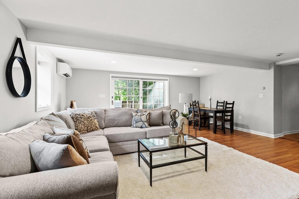 33 Doncaster Circle Lynnfield, MA 01940 - Photo 24 of 31 a living room with furniture and a large window