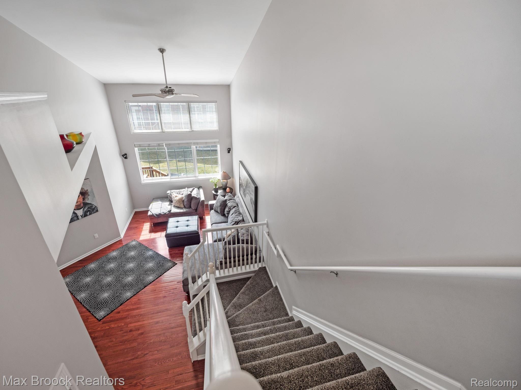41491 Mitchell Road Novi, MI 48377 - Photo 19 of 28 Living space showing large two story windows.