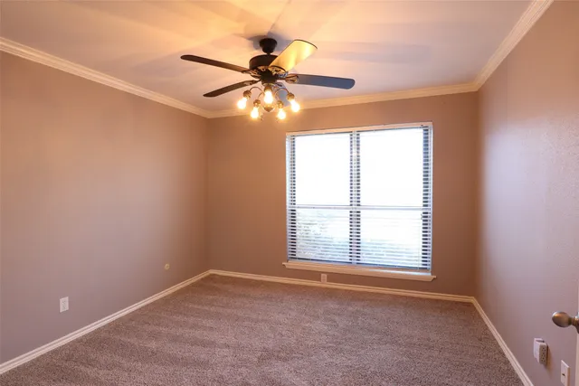 a bathroom with a granite countertop toilet and a shower