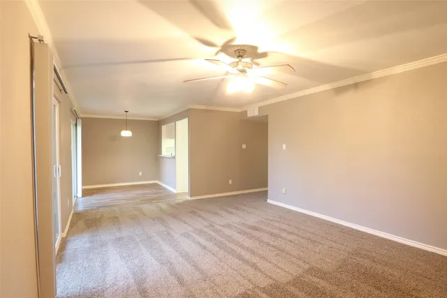a bathroom with a granite countertop shower sink and mirror