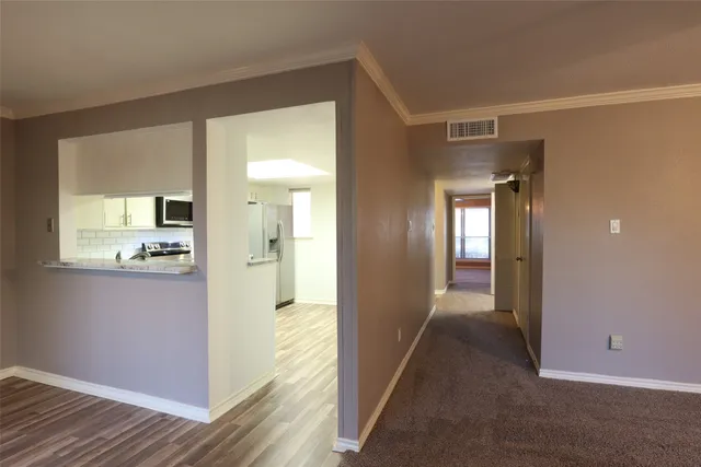 a bathroom with a shower and a toilet