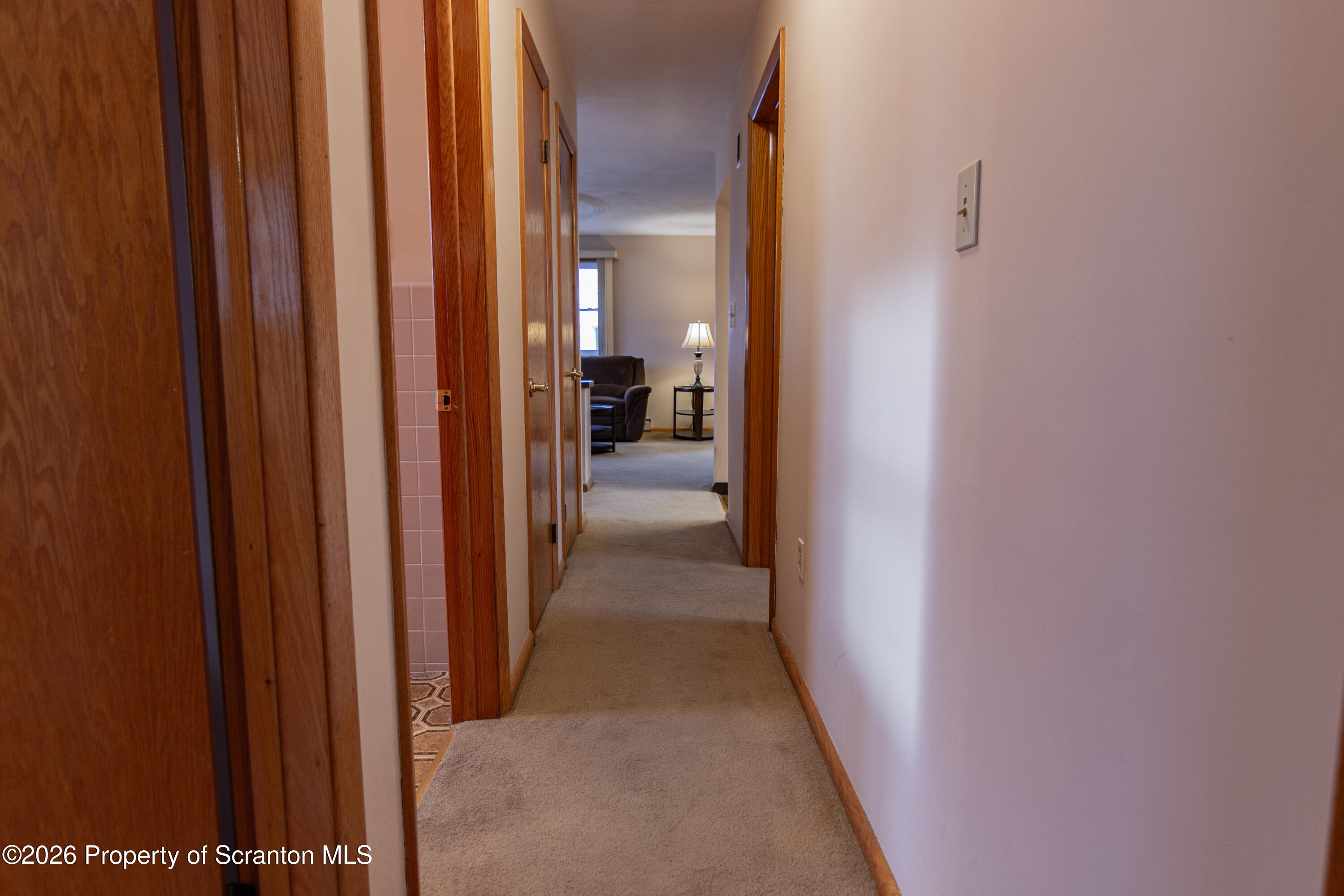 1215 Mine Street Old Forge, PA 18518 - Photo 12 of 34 a view of a livingroom from a hallway