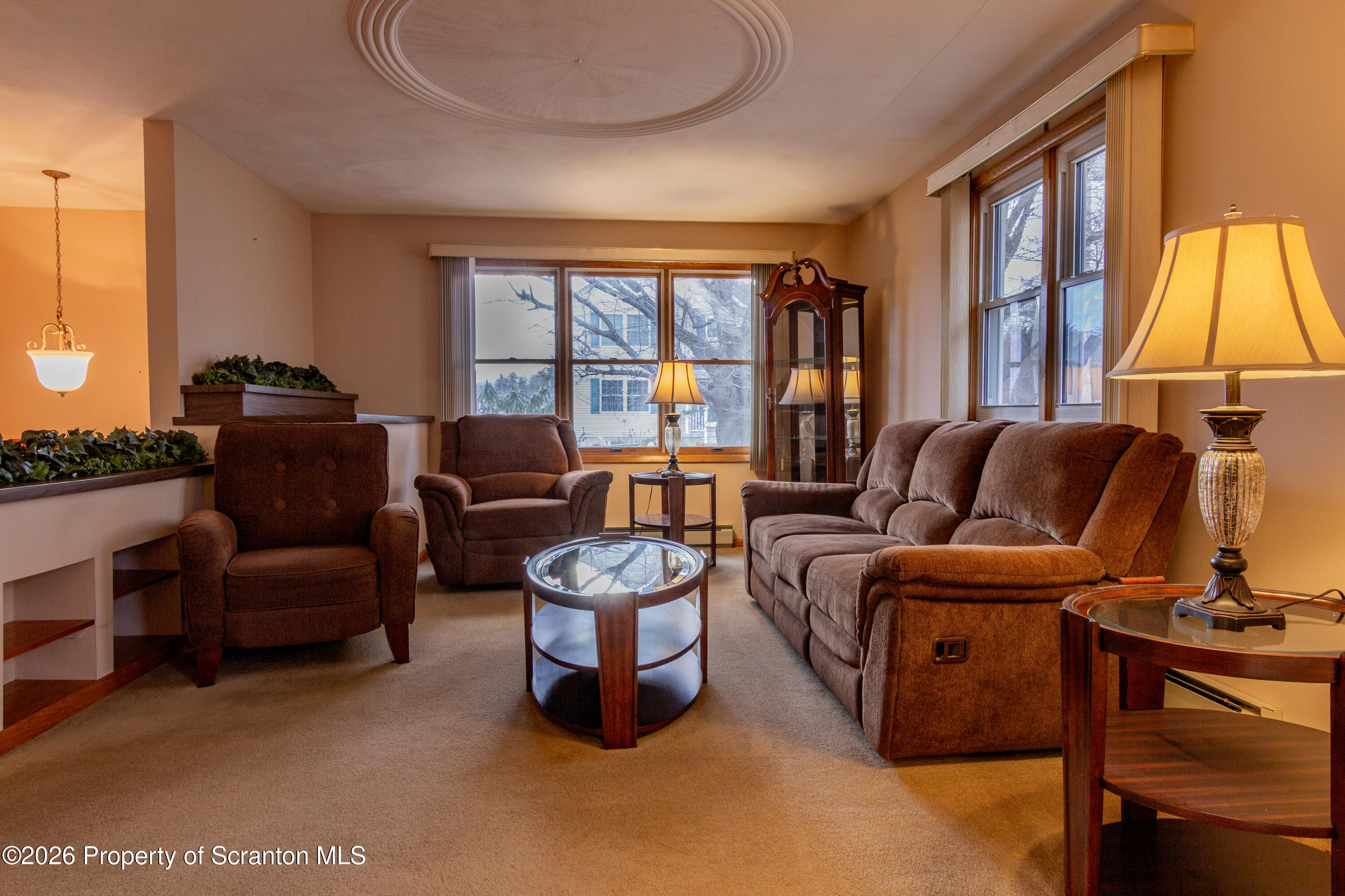 1215 Mine Street Old Forge, PA 18518 - Photo 22 of 34 a living room with furniture and a large window