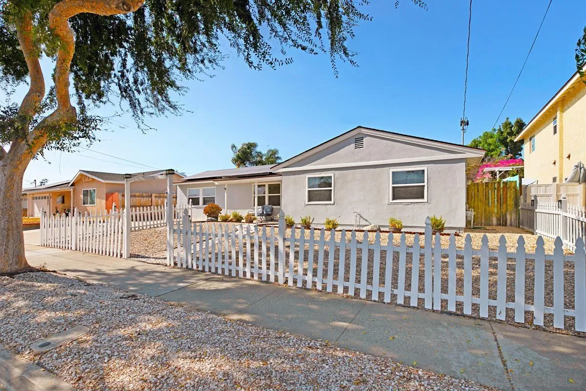 9452 Pike Road Santee, CA 92071 - Photo 3 of 26 a front view of a house with a yard