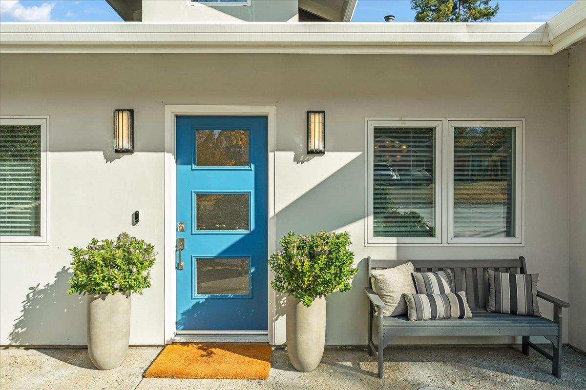 1233 Crompton Road Redwood City, CA 94061 - Photo 2 of 28 a view of porch with a bench and windows