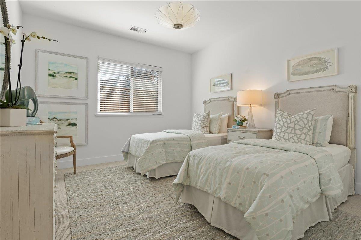 1233 Crompton Road Redwood City, CA 94061 - Photo 21 of 28 a spacious bedroom with two beds and painting on the wall