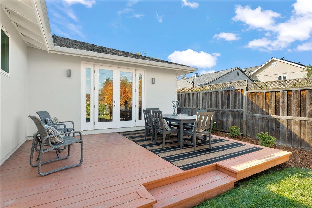 1233 Crompton Road Redwood City, CA 94061 - Photo 24 of 28 a view of a patio with a table and chairs