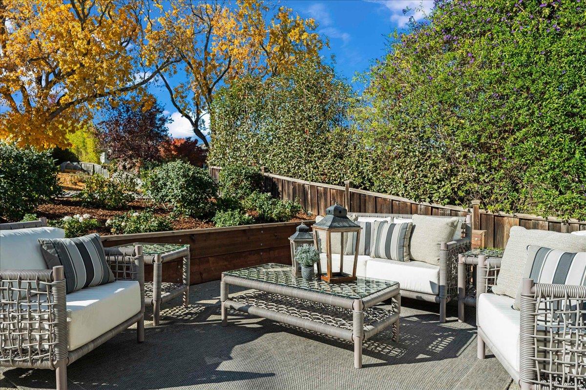 1233 Crompton Road Redwood City, CA 94061 - Photo 28 of 28 a roof deck with couches and wooden fence