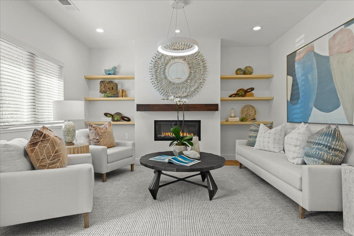 1233 Crompton Road Redwood City, CA 94061 - Photo 3 of 28 a living room with furniture a rug and a fireplace