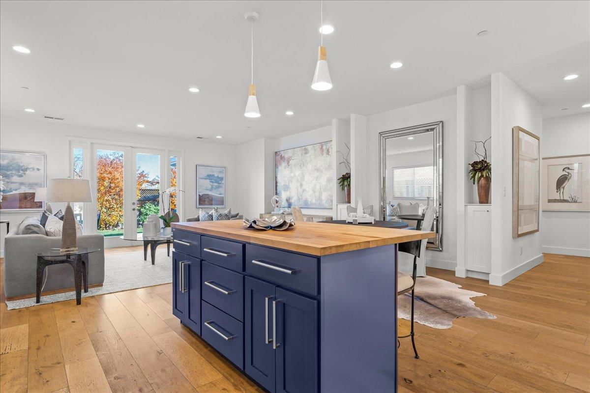 1233 Crompton Road Redwood City, CA 94061 - Photo 7 of 28 a large kitchen with stainless steel appliances granite countertop a large counter top a sink and a refrigerator