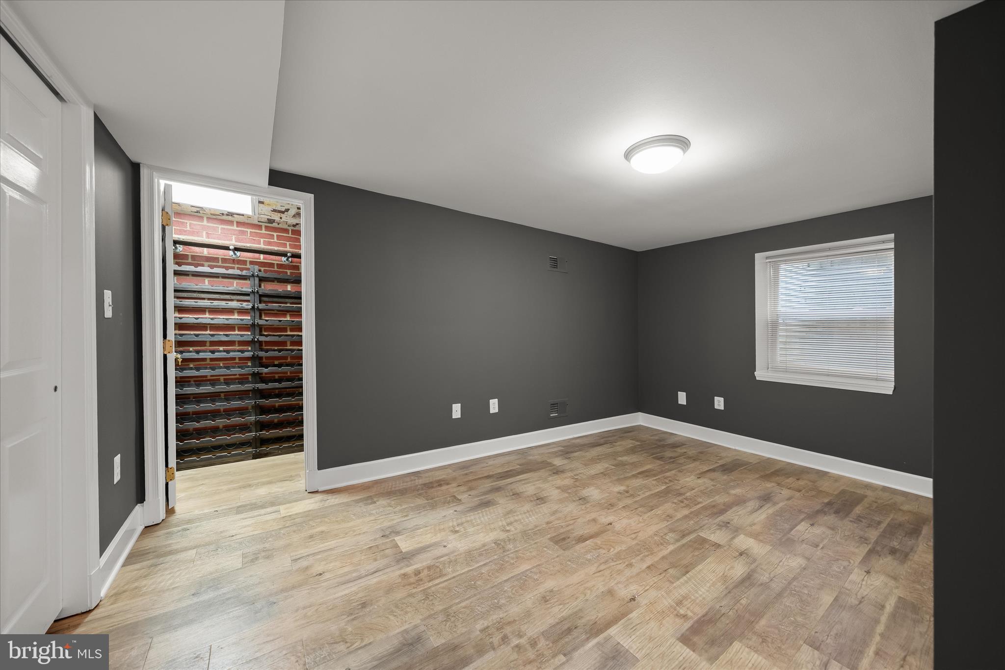 5104 Scarsdale Road Bethesda, MD 20816 - Photo 54 of 68 a view of an empty room with a window