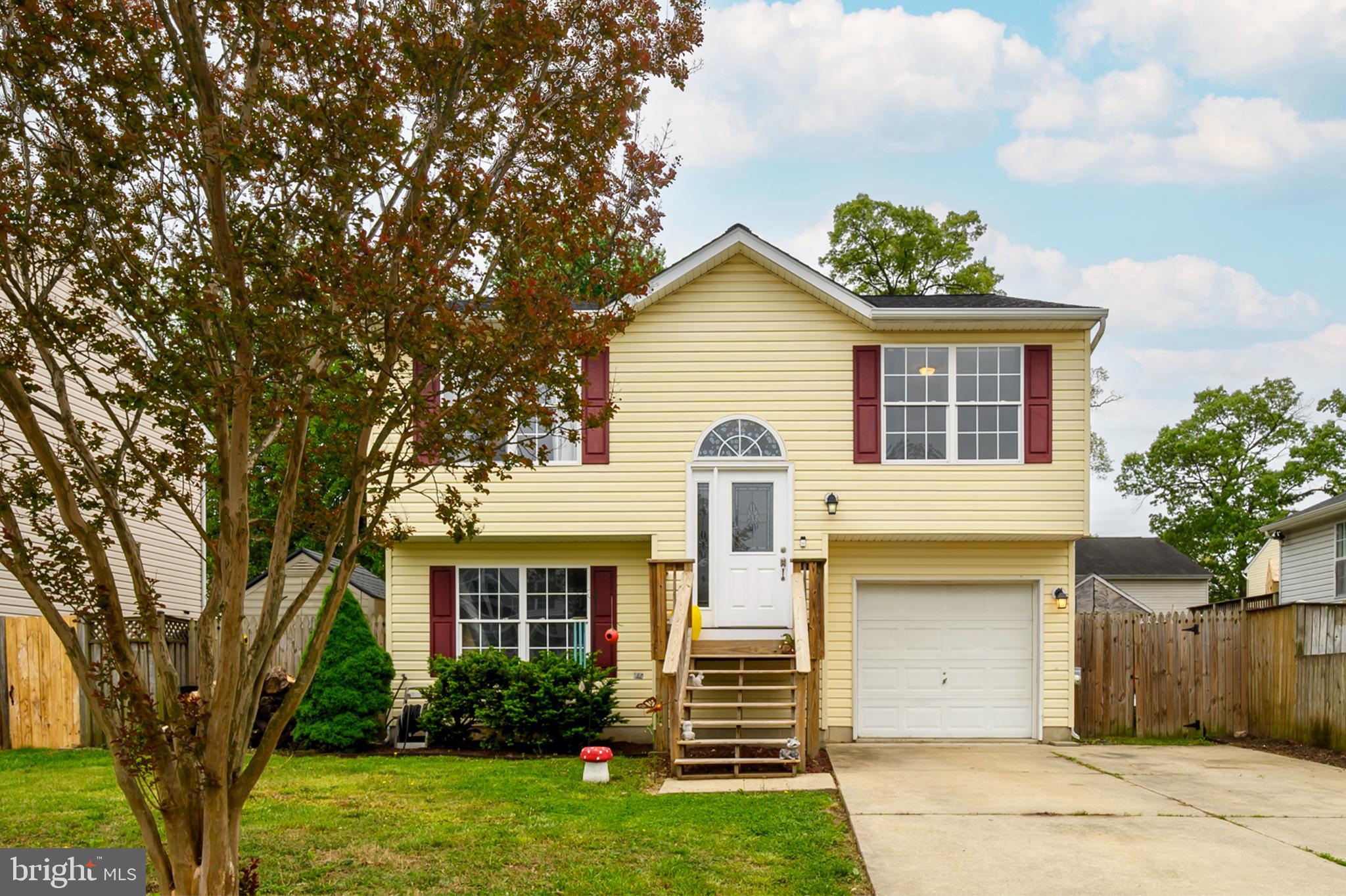757 209th Street Pasadena, MD 21122 - Photo 1 of 32 a front view of a house with a yard