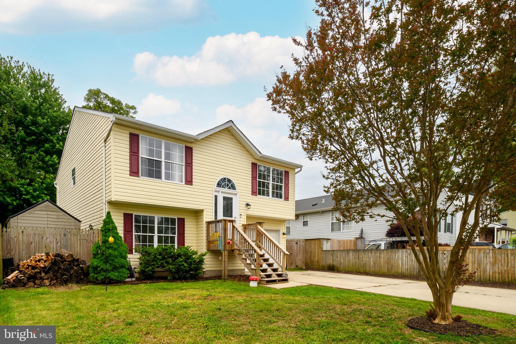 757 209th Street Pasadena, MD 21122 - Photo 2 of 32 a view of a house with a yard