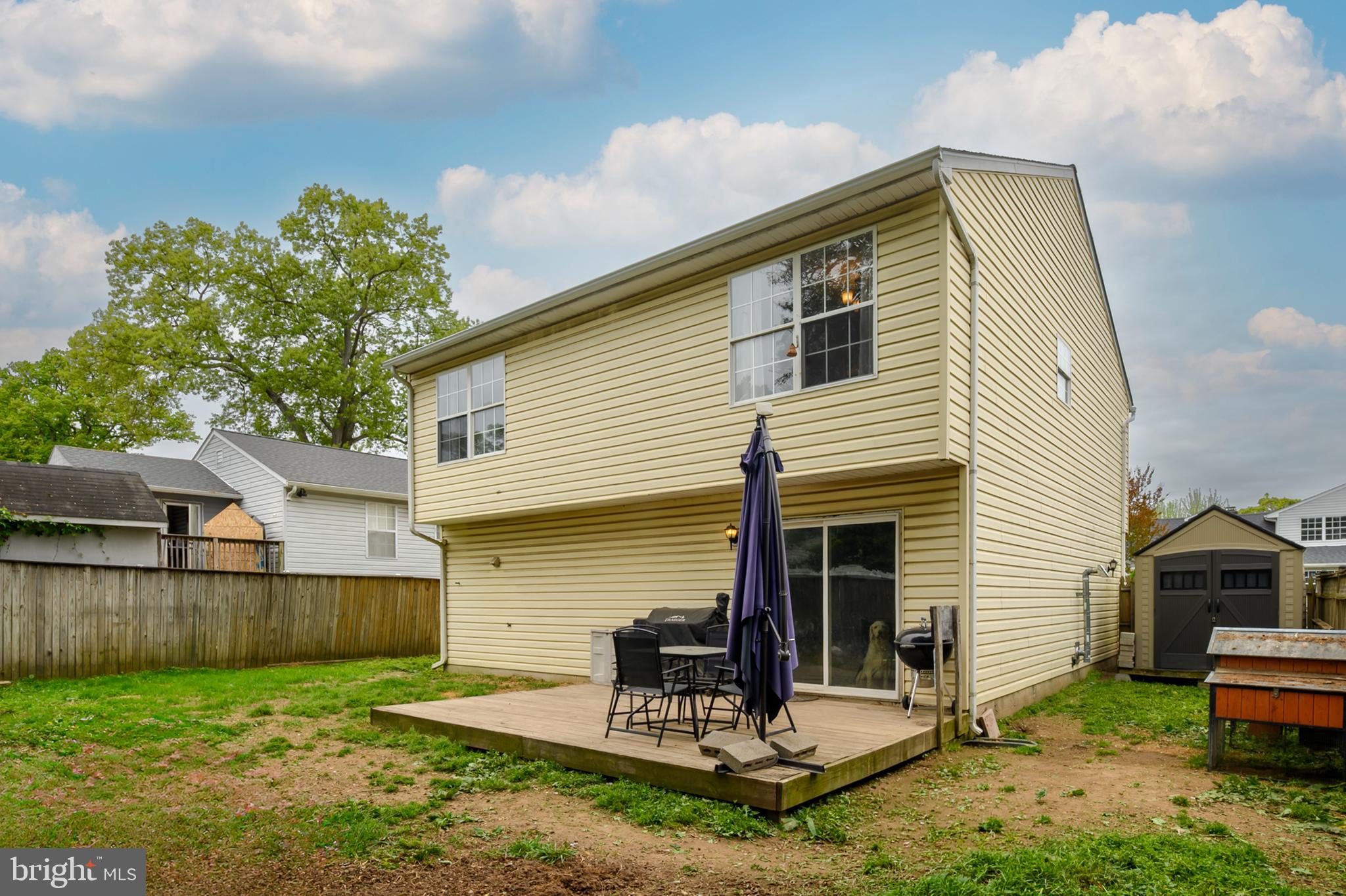 757 209th Street Pasadena, MD 21122 - Photo 22 of 32 a view of a house with backyard and sitting area