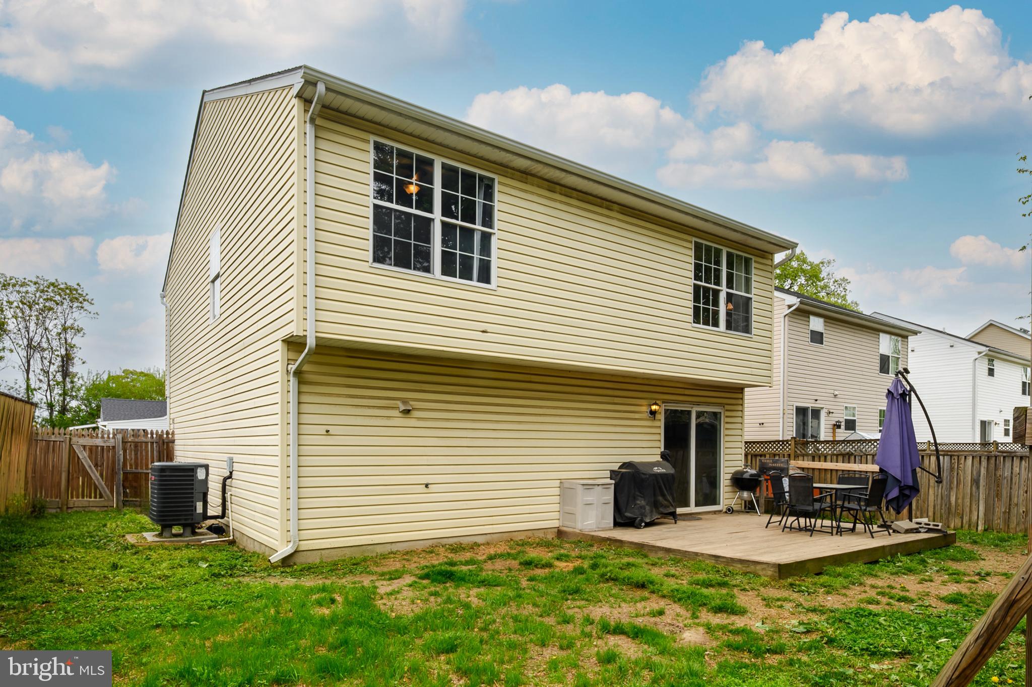 757 209th Street Pasadena, MD 21122 - Photo 23 of 32 a view of a house with backyard and sitting area
