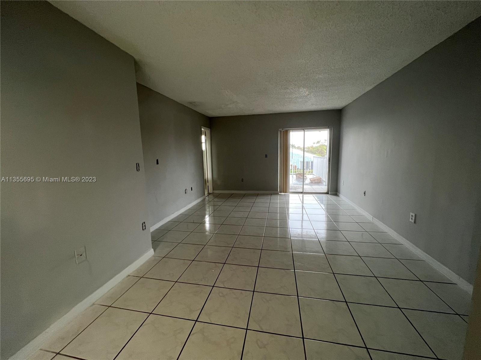 14661 Southwest 99th Street Miami, FL 33186 - Photo 10 of 14 a view of empty room