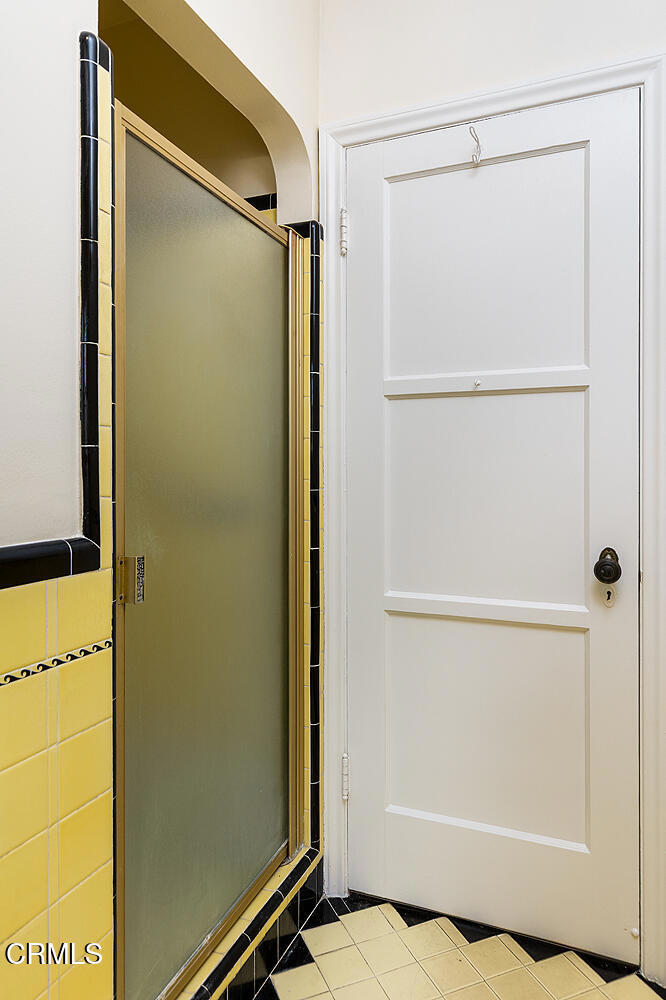 1012 South 2nd Street Alhambra, CA 91801 - Photo 17 of 25 a bathroom with a glass shower door