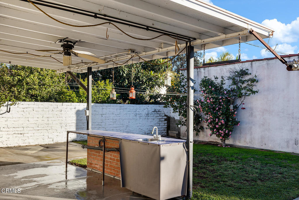 1012 South 2nd Street Alhambra, CA 91801 - Photo 24 of 25 a view of a patio with table and chairs with wooden floor and plants
