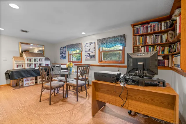 a view of a workspace with furniture