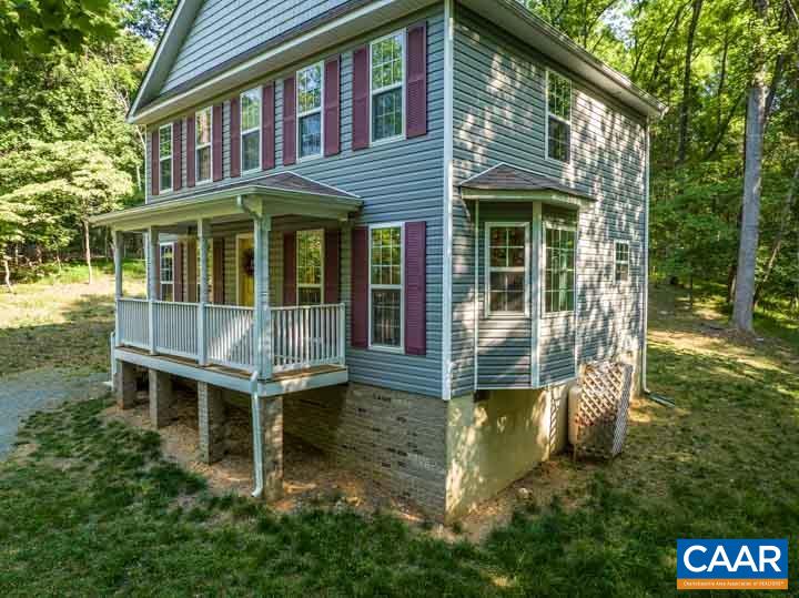 46 Brougham Road Palmyra, VA 22963 - Photo 3 of 27 a front view of a house with a yard