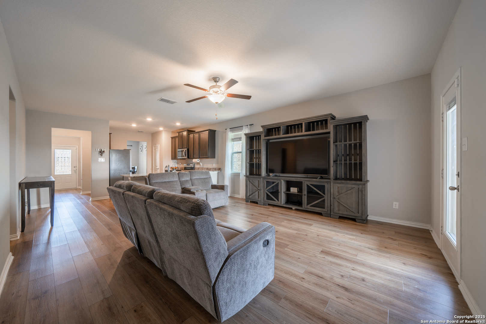 6430 Thorpe Converse, TX 78109 - Photo 11 of 25 a living room with furniture and a flat screen tv