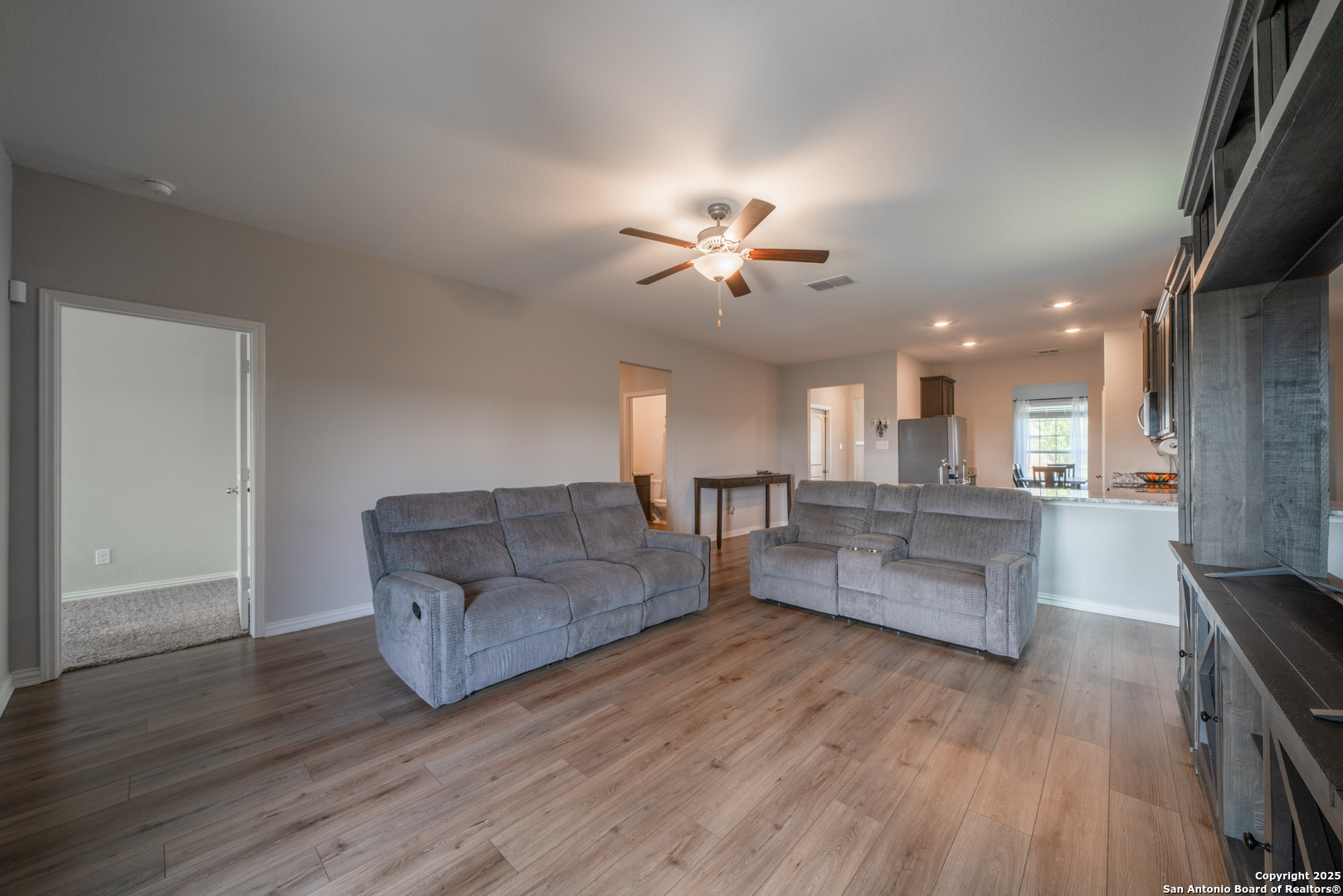 6430 Thorpe Converse, TX 78109 - Photo 12 of 25 a living room with furniture and a wooden floor