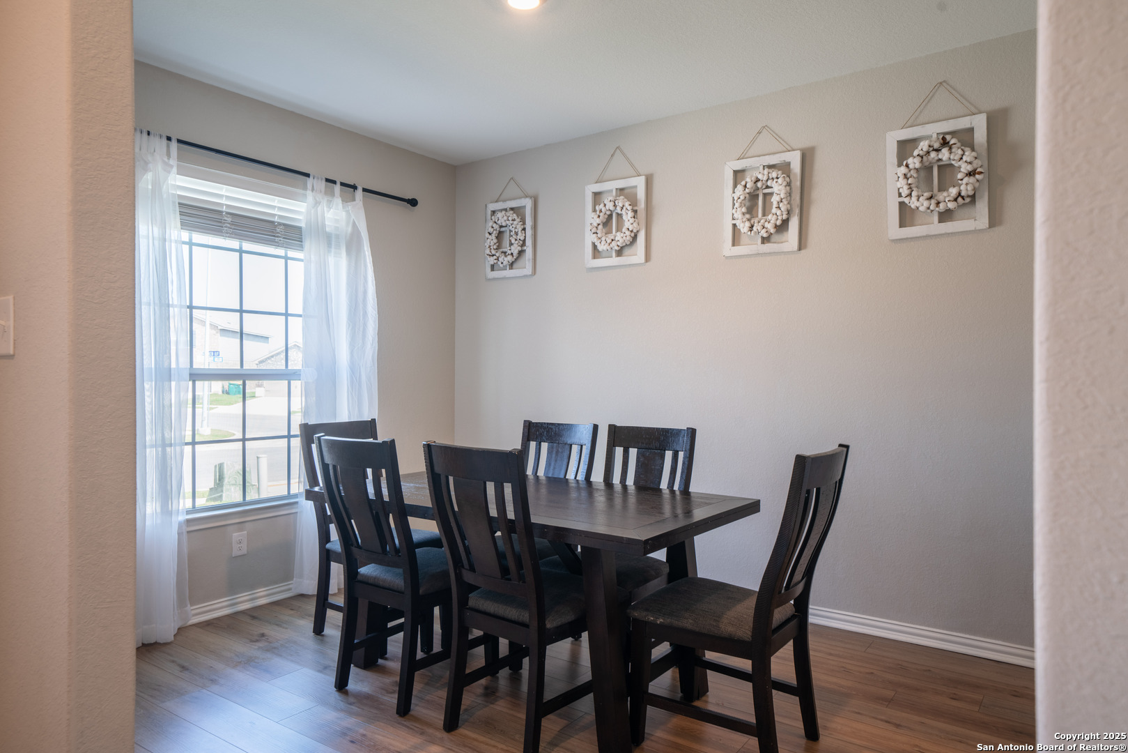 6430 Thorpe Converse, TX 78109 - Photo 14 of 25 a view of a dining room with furniture and wooden floor