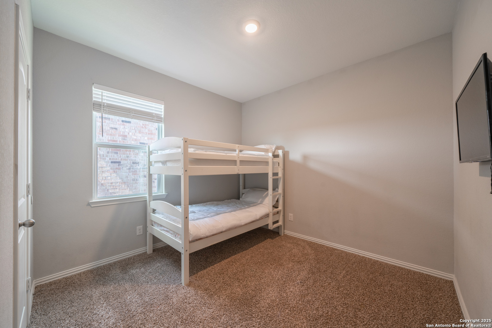 6430 Thorpe Converse, TX 78109 - Photo 21 of 25 a bedroom with bunk bed