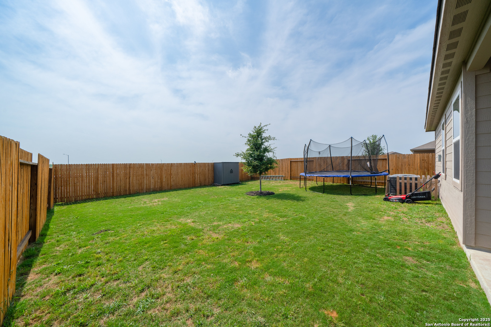 6430 Thorpe Converse, TX 78109 - Photo 24 of 25 a view of yard with barbeque and wooden fence