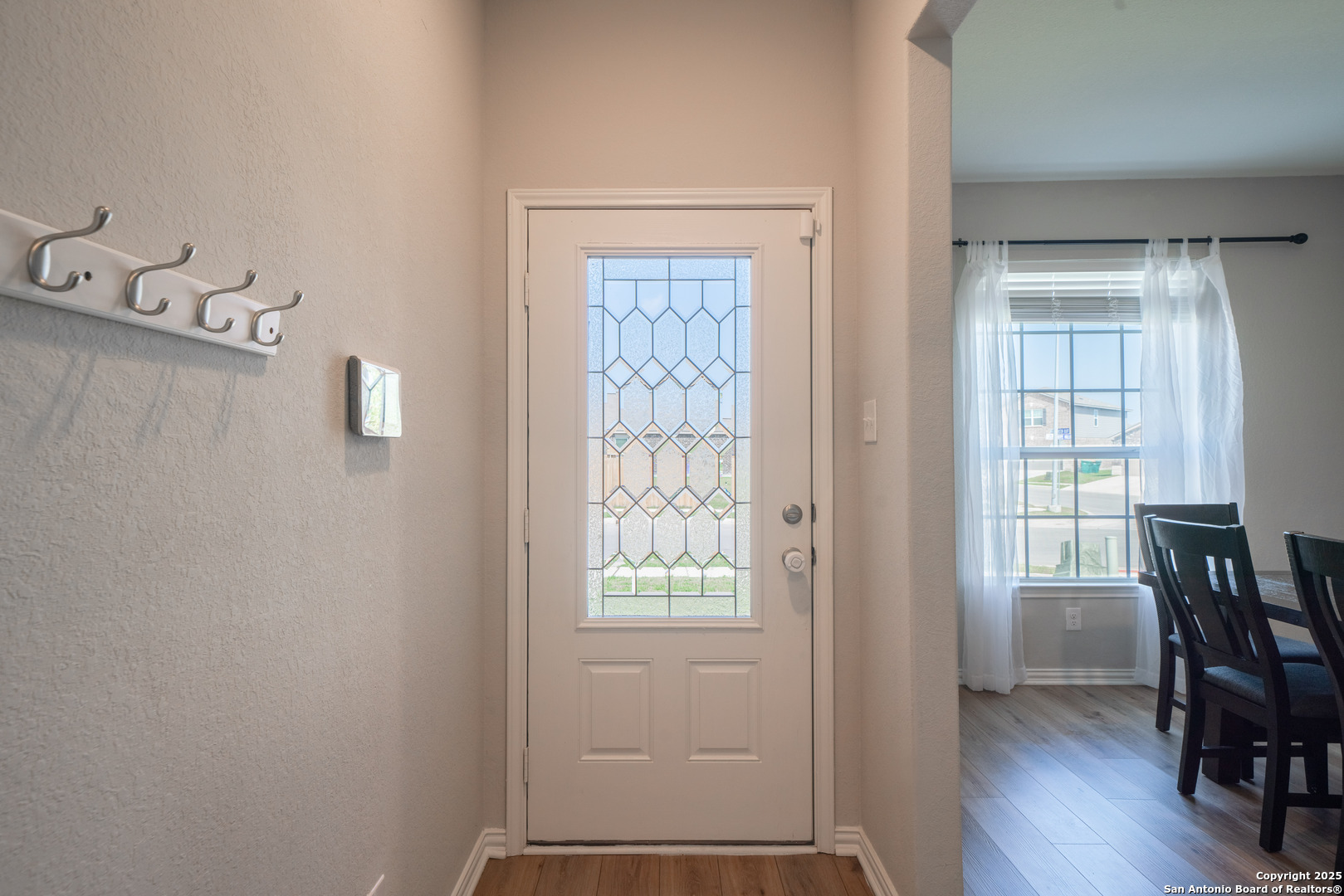 6430 Thorpe Converse, TX 78109 - Photo 4 of 25 a view of a livingroom with furniture and hardwood floor